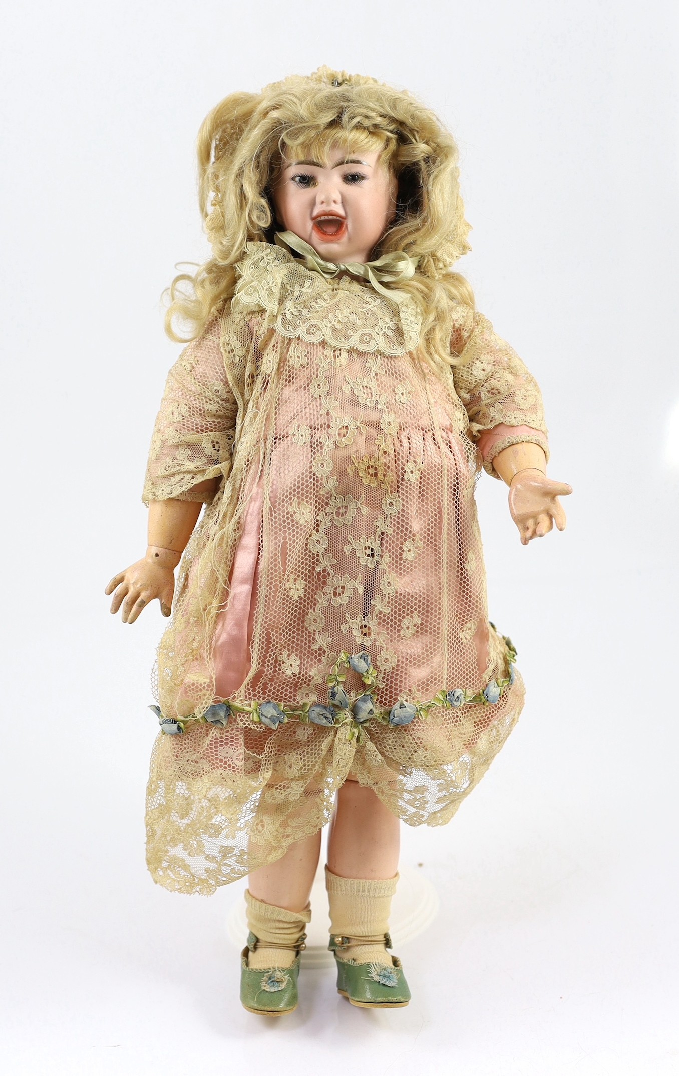 A fine and rare Jumeau pressed bisque two-faced doll, French, circa 1885, 18in.